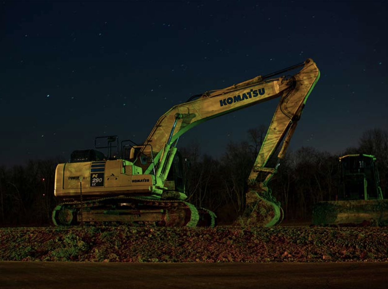 Komatsu тоже приостанавливает работу с Россией