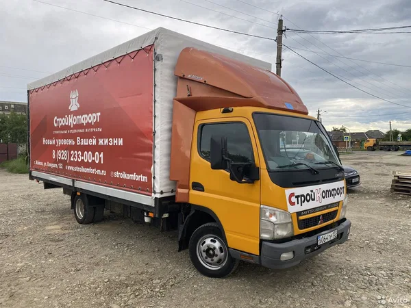 Тентованный автомобиль Mitsubisi Fuso Canter