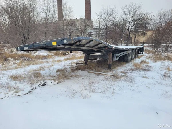 Бортовой полуприцеп Тонар 9746