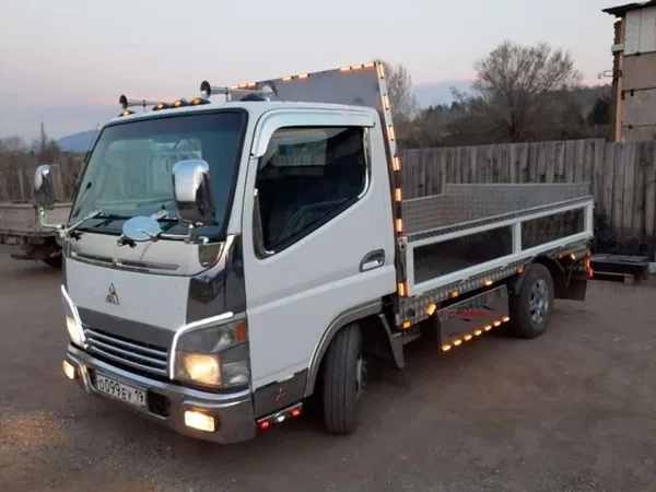 Бортовой автомобиль Mitsubishi Canter