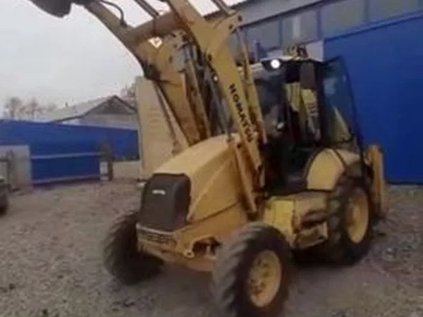 Экскаватор-погрузчик Komatsu