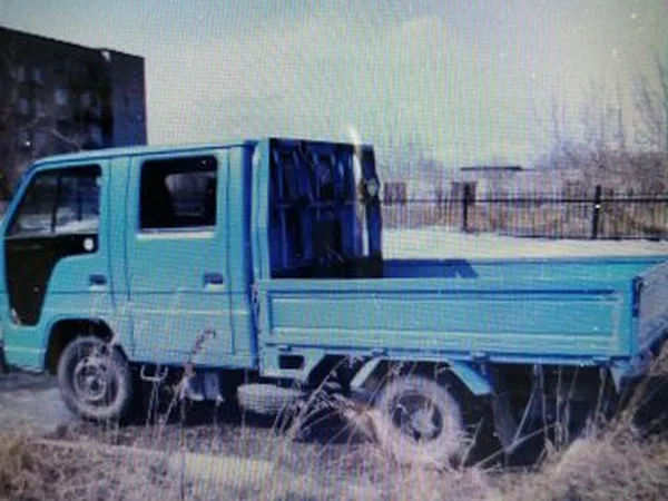 Бортовой автомобиль Isuzu ELF