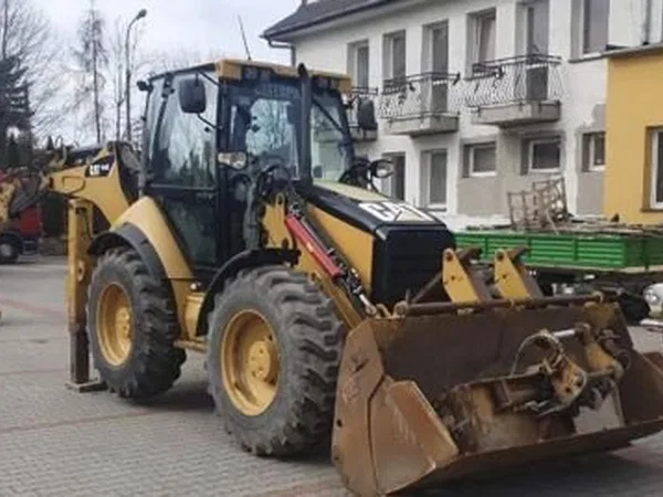 Экскаватор-погрузчик Caterpillar 444E