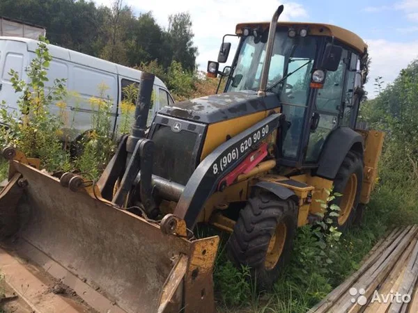 Экскаватор-погрузчик John Deere