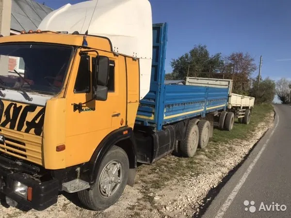 Бортовой грузовик КамАЗ 53212 с прицепом ГКБ-8350