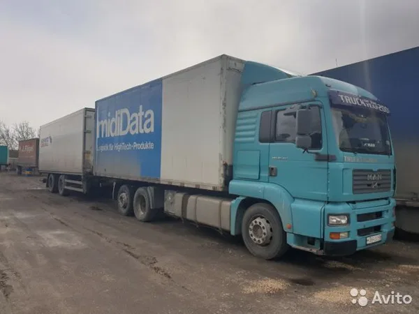 Тентованный грузовик MAN TGA