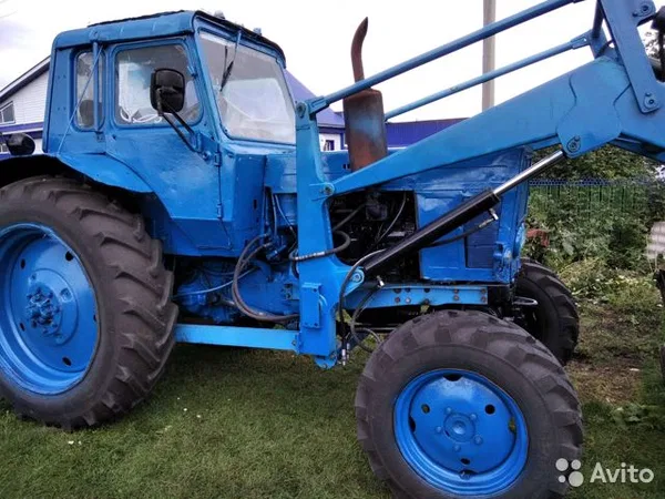 Трактор МТЗ Беларус 82 с куном ПКУ 0,9