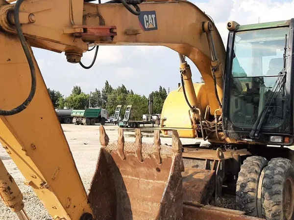 Колесный экскаватор Caterpillar M313C