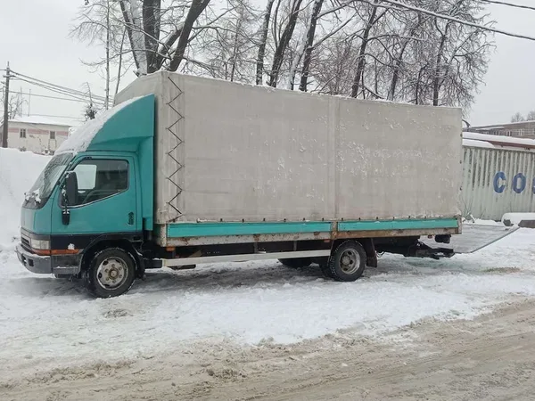 Тентованный автомобиль Mitsubishi Fuso Canter