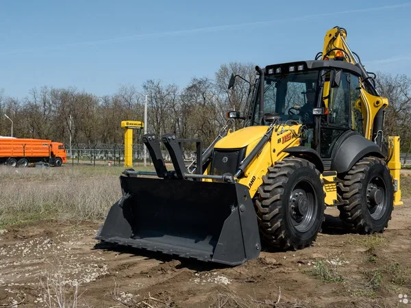 Экскаватор-погрузчик New Holland B115B