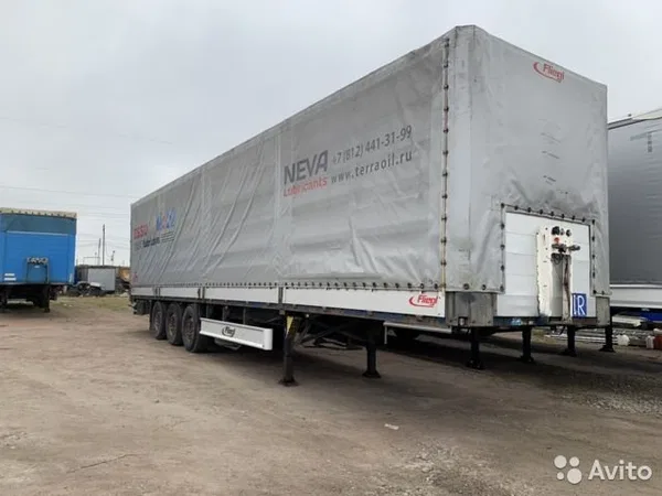 Тентованный полуприцеп Fliegl