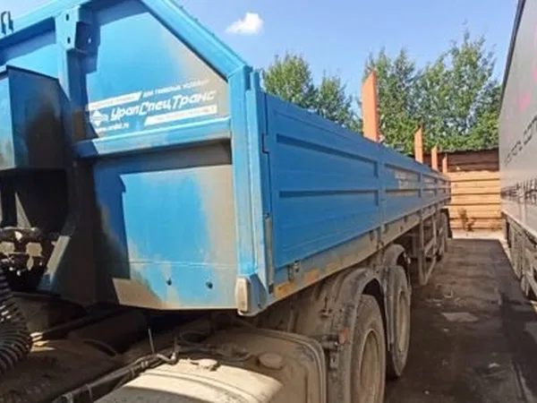 Бортовой полуприцеп УралСпецТранс 94651L