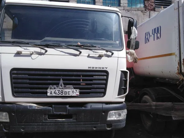 Мусоровоз МАЗ 4571Р2