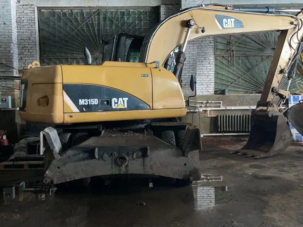 Колесный экскаватор Caterpillar M315D