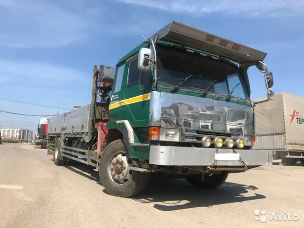Бортовой грузовик с КМУ Mitsubishi Fuso Canter