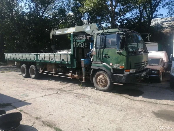 Бортовой грузовик с КМУ Nissan Diesel UD