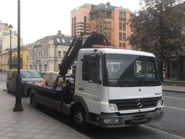 Эвакуатор Mercedes-Benz с КМУ