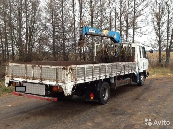 Бортовой грузовик с КМУ Nissan Diesel
