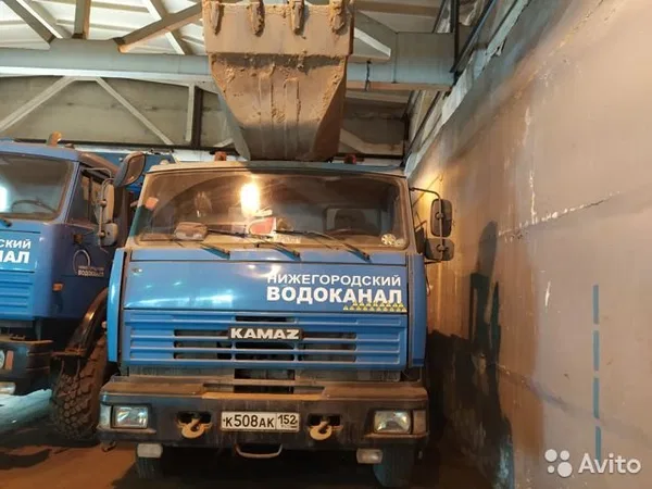 Экскаватор-планировщик EW-25-М1.103 на шасси КамАЗ-65111