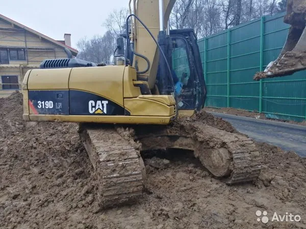 Гусеничный экскаватор Caterpillar 319DLN