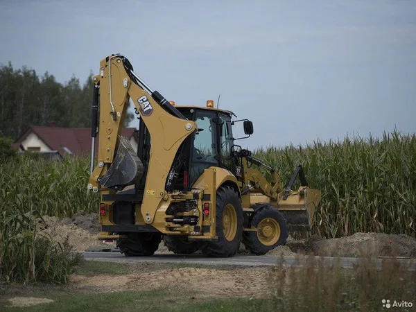 Экскаватор-погрузчик Caterpillar 432