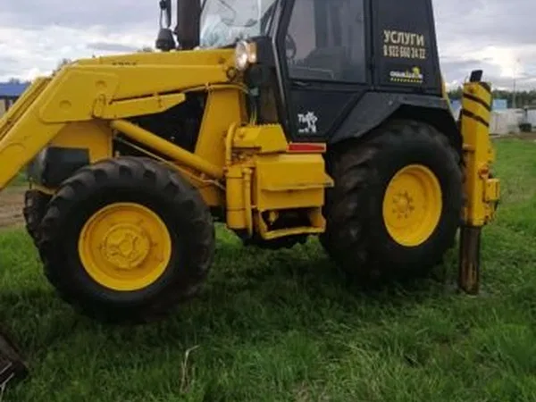 Экскаватор-погрузчик Атек 999Е-1
