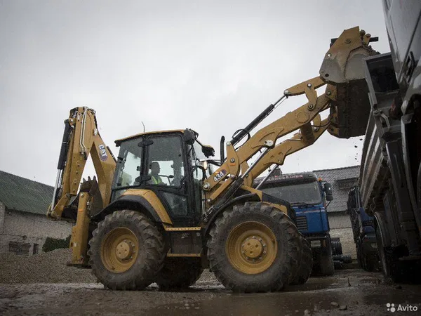 Экскаватор-погрузчик Caterpillar 434