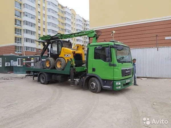 Эвакуатор MAN TGL 12.180 с КМУ