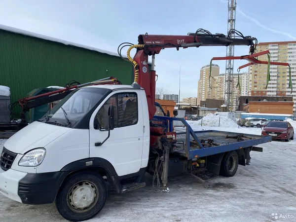 Эвакуатор ГАЗ Валдай 33104 с КМУ