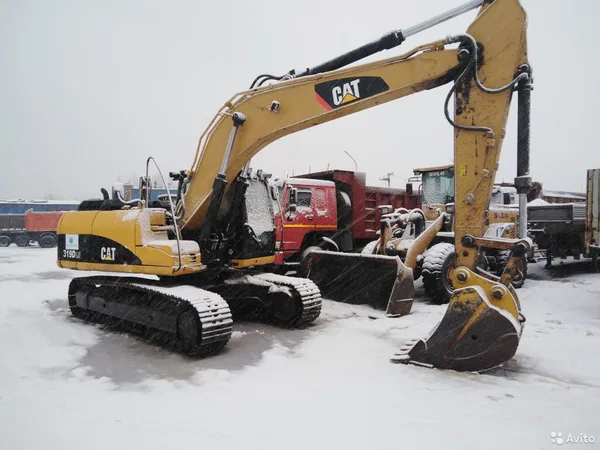 Гусеничный экскаватор Caterpillar 319D LN