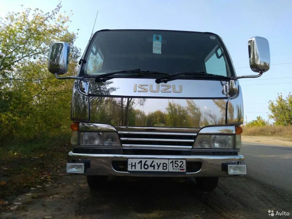 Бортовой автомобиль Isuzu ELF