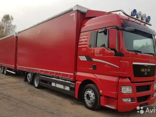 Тентованный грузовик MAN TGX 26.440