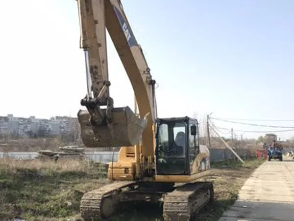 Гусеничный экскаватор Caterpillar 320 DL