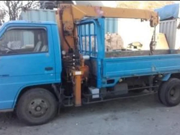 Бортовой грузовик с КМУ ISUZU Elf 250