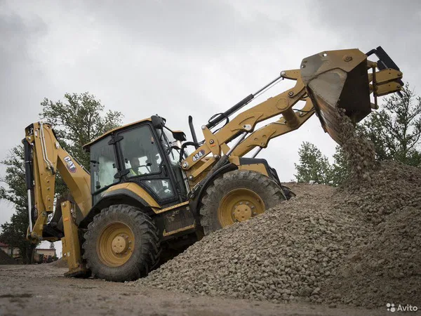 Экскаватор-погрузчик Caterpillar 434