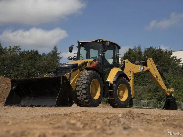 Экскаватор-погрузчик Caterpillar 444