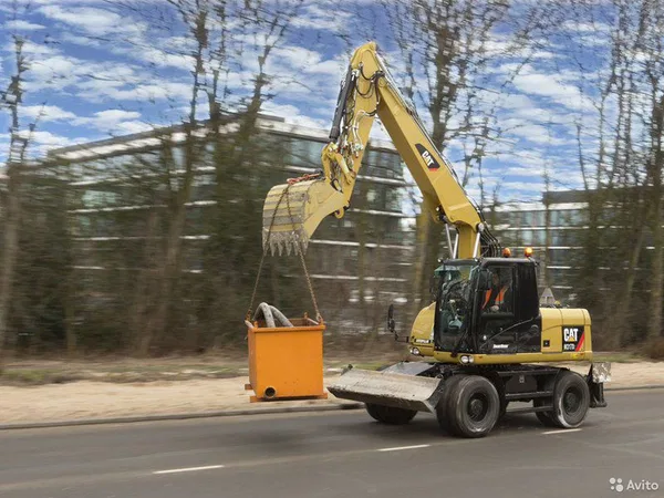 Колесный экскаватор Caterpillar M317D2