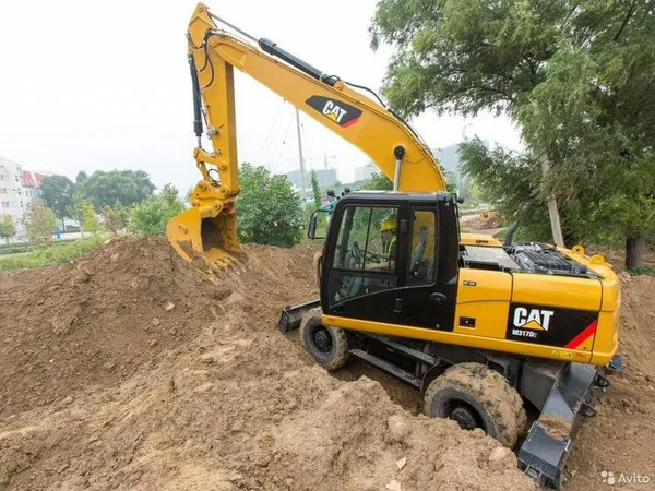 Колесный экскаватор Caterpillar M317D2