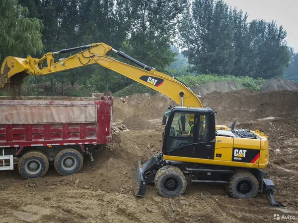 Колесный экскаватор Caterpillar M317D2
