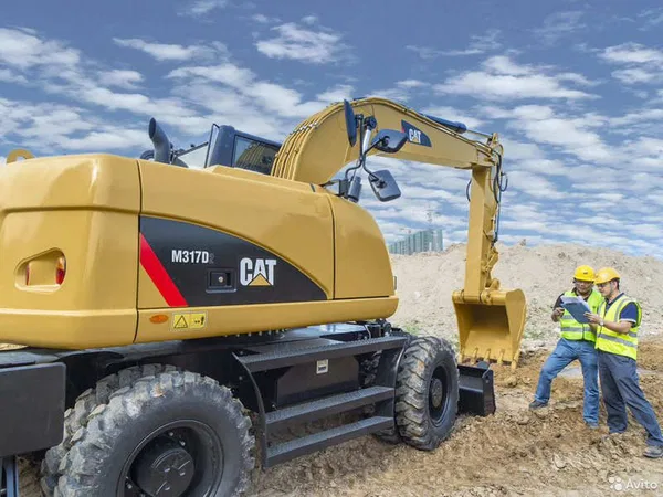 Колесный экскаватор Caterpillar M317D2