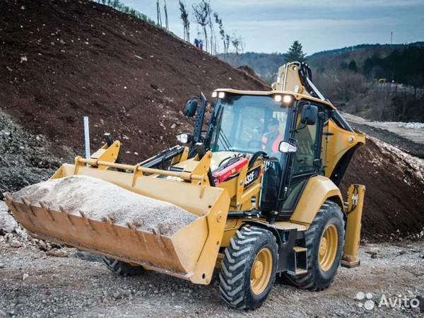 Экскаватор-погрузчик Caterpillar 432