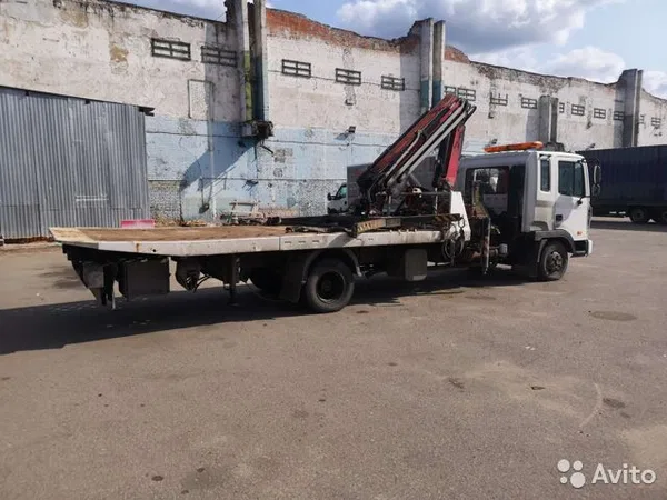 Эвакуатор Hyundai HD120 с КМУ