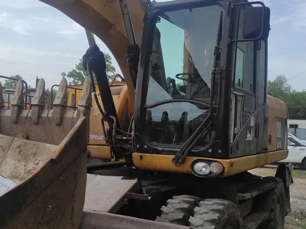 Колесный экскаватор Caterpillar M315D