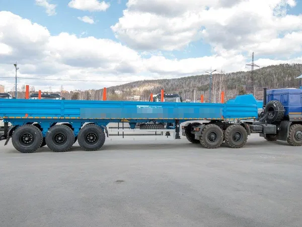 Бортовой полуприцеп УралСпецТранс 40-31-12К