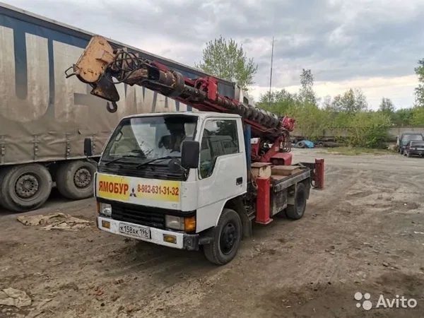 Бурильно-крановая машина Aichi D501