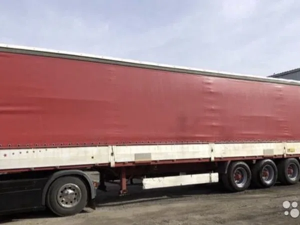 Тентованный полуприцеп Krone