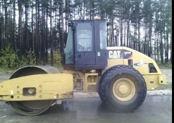 Вибрационный комбинированный каток        Caterpillar CAT