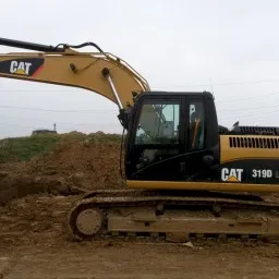 Гусеничный экскаватор Caterpillar 319 DLN