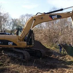 Гусеничный экскаватор Caterpillar 319 DLN