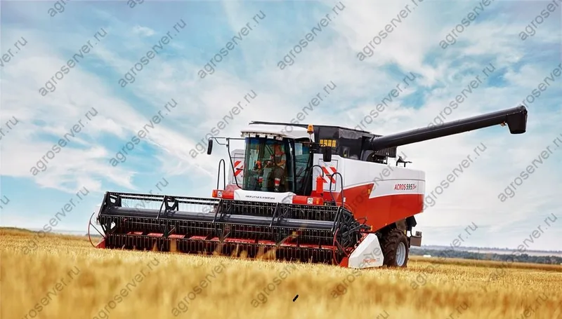 Комбайн New Holland 200